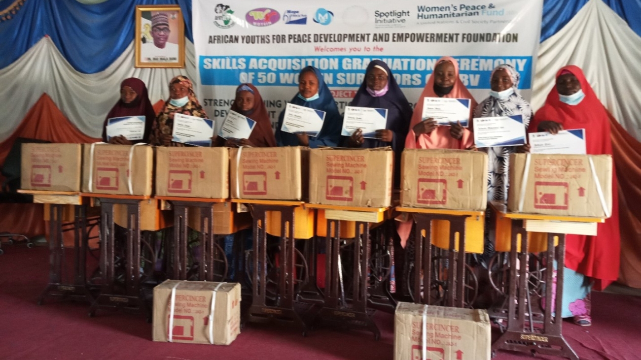 A group of fashion designing graduates who have successfully completed their skills training program.